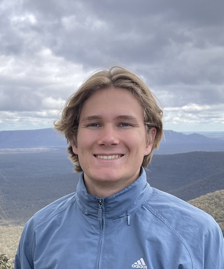 Karl Luebs outdoors in the mountains